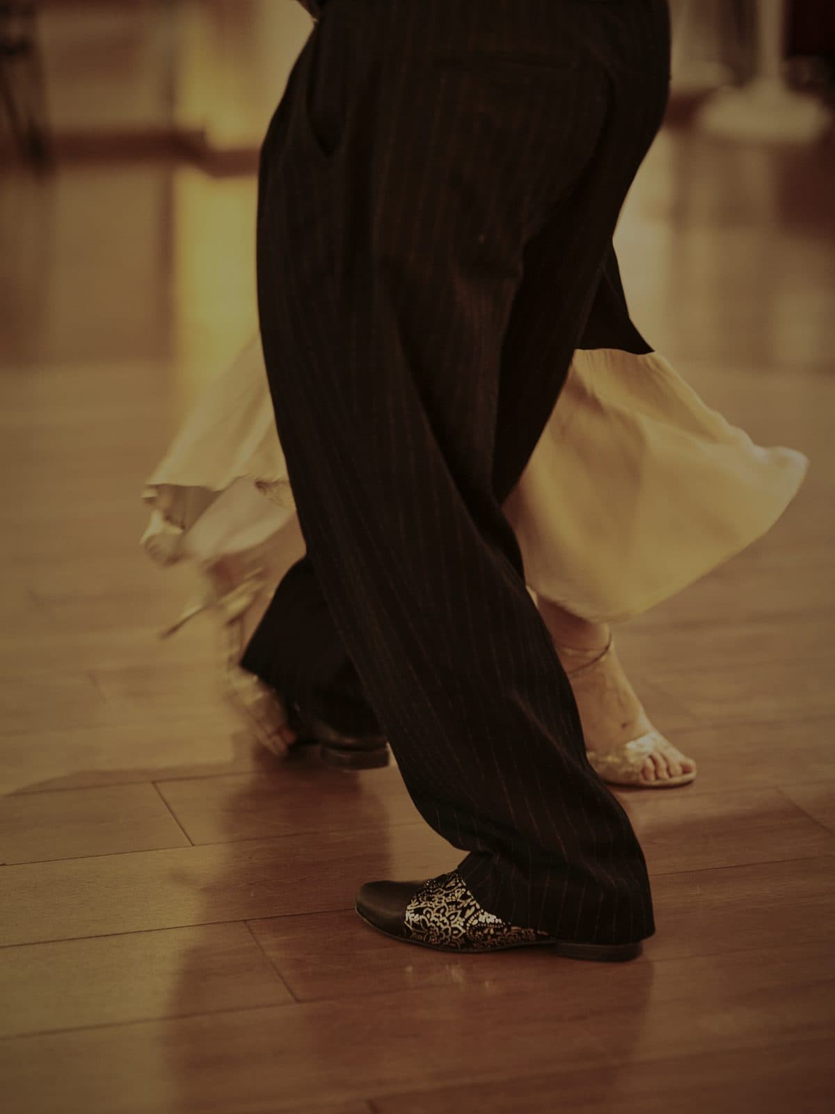A couple working through a figure on the studio floor